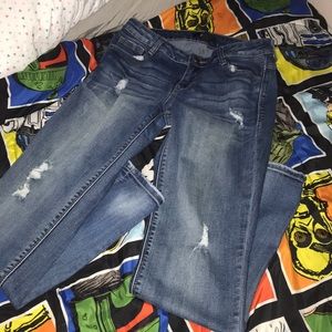 distressed low rise jeans